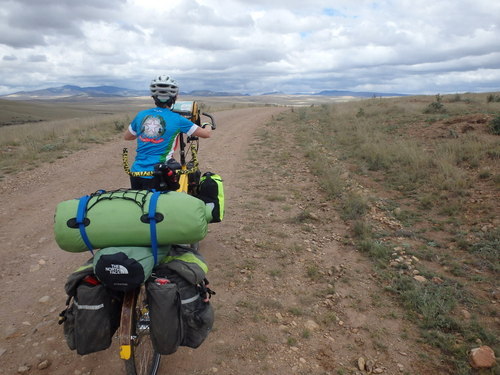 GDMBR: Terry and the Bee, we had just pushed the bike up some loose gravel.